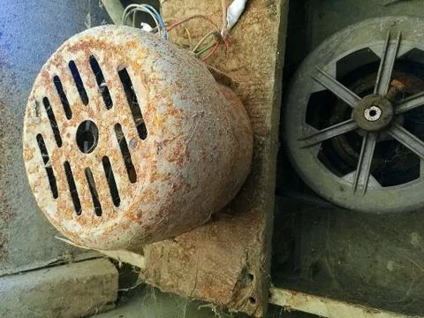 Rusty washing machine motor fixed in the machine Stock Photos