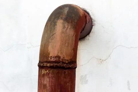 Rusty water pipe and  peeling paint Stock Photos
