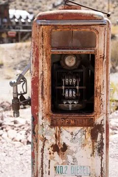 Rusty, weathered, broken, gasoline pump in the desert Stock Photos