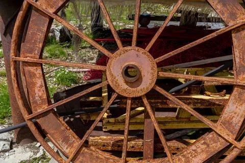 Rusty wheel from the cable car in the mountains of the North Caucasus. Stock Photos