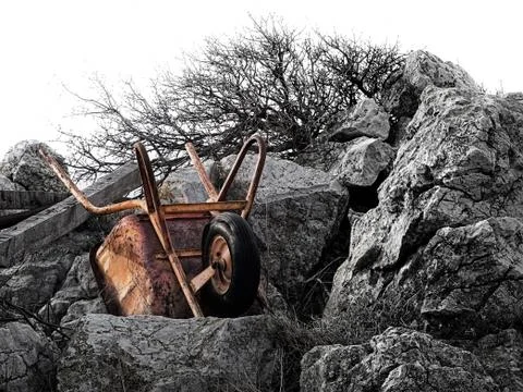 Rusty wheelbarrow Stock Photos