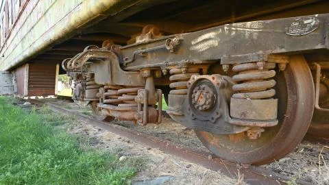 Rusty wheels of a freight train Stock Photos