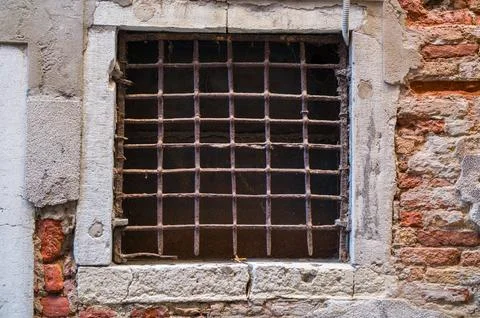 Rusty Window in an Old Wall Stock Photos
