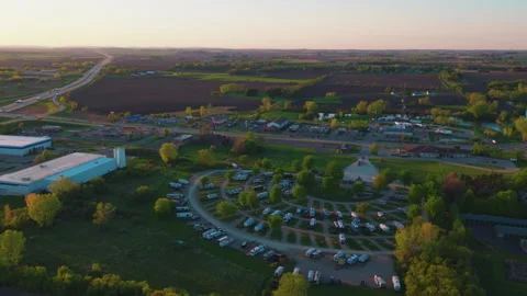 RV Boom on the Interstate: DeForest Wisconsin Campground Full at Sunset Stock Footage 339644932