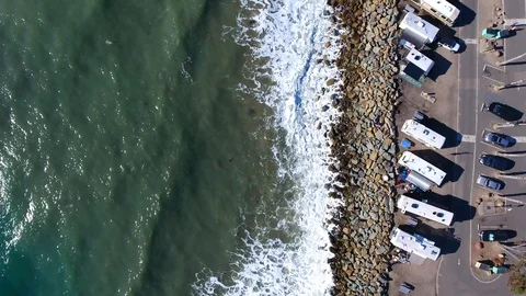 RV Campground on with waves at the beach. Stock Footage 100498259