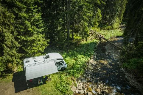 RV Deep in the Woods Stock Photos