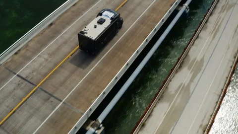 RV driving bridge in Key West Stock Footage 126235281