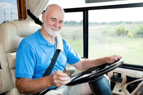 RV Senior - Navigating with GPS Stock Photos