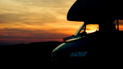 RV at Sunset in Open Landscape Stock Photos