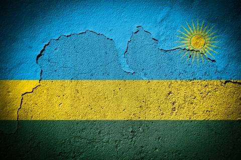 Rwanda flag on cracked wall Stock Photos