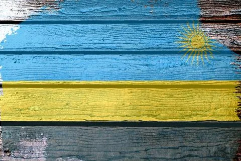 Rwanda flag - realistic looking flag on a wooden surface Stock Illustration