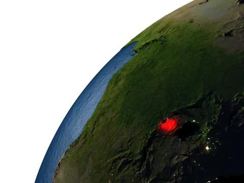 Rwanda in red on Earth at night Illustrazione stock