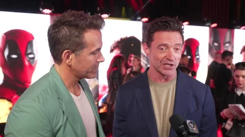 Ryan Reynolds and Hugh Jackman on the red carpet of Deadpool &amp; Wolverine Stock Footage 279186014