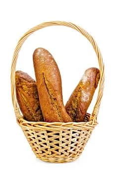 Rye baguettes in a wicker basket Stock Photos