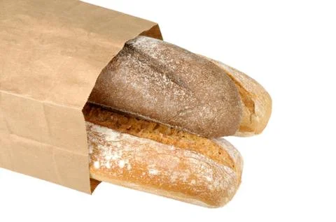 Rye bread and wheat bread in paper bag Stock Photos