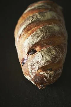 Rye bread on a black background Stock Photos