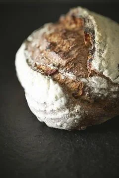 Rye bread on a black background Stock Photos