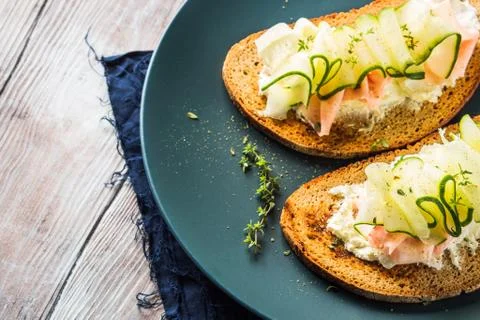 Rye bread with cucumber and cheese Stock Photos
