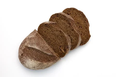 Rye bread cut into slices on white background, top view Stock Photos