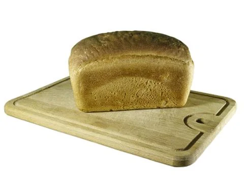 Rye-bread on cutting board on white Stock Photos