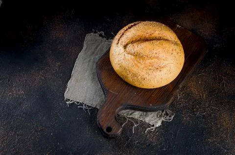 Rye bread on dark background Stock Photos