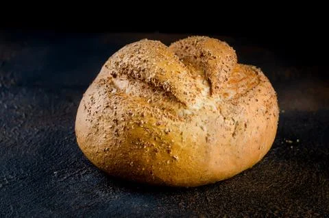 Rye bread on dark background Stock Photos