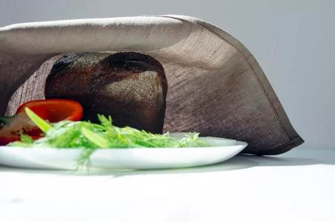 Rye bread, egg and pepper on a white background Stock Photos