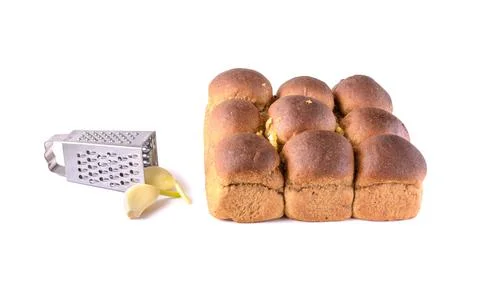 Rye bread with garlic is isolated on a white background, selective focus. Stock Photos