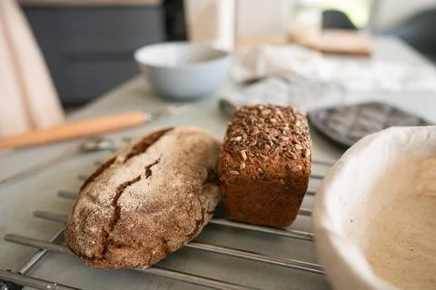 Rye bread in a plate on the kitchen table Stock Photos