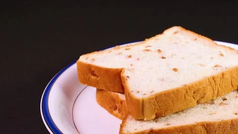 Rye bread on a plate rotating Stock Footage 312533248