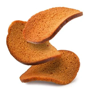 Rye bread rusks flying on a white background. Isolated Stock Photos