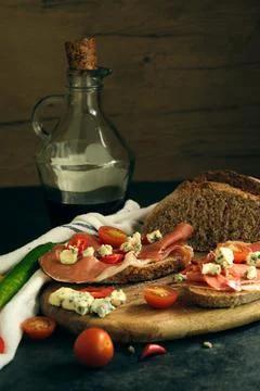 Rye bread with slices of jamon and cheese 스톡 사진