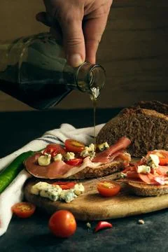 Rye bread with slices of jamon and cheese Stock-Fotos