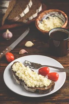 Rye bread toast with processed cheese and garlic Stock Photos