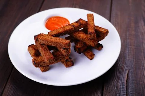 Rye bread toasts with tomato sauce Stock Photos
