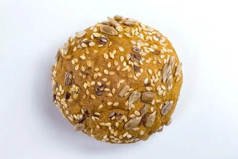 Rye bun seeded on a white background, macro Stock Photos