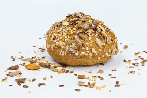 Rye bun seeded on a white background, macro Stock Photos