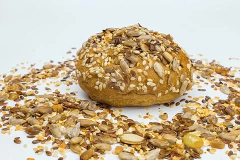 Rye bun seeded on a white background, macro Foto stock
