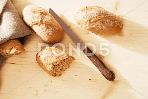 Rye buns from top with a linen textile Stock Photos