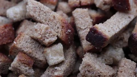 Rye Crackers In A Black Plate. Bread Crispy Crackers. Breadcrumbs. Close Up. Top Stock Footage 234056708
