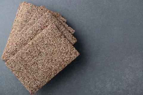 Rye crackers on a grey table. Healthy organic food. Copy space Stock Photos