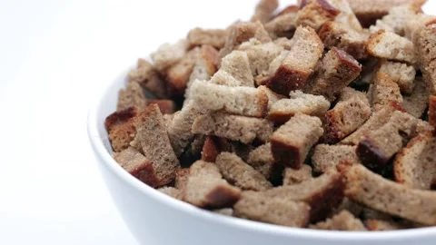 Rye Crackers In A White Bowl. Bread Crispy Crackers. Breadcrumbs. Panning Dolly  Video stock 233263291