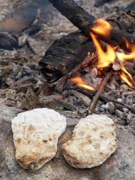 Rye flatbread on the fire Stock Photos