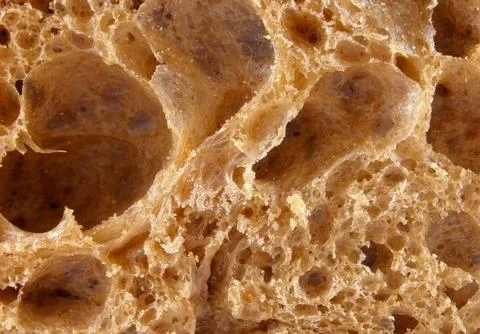 Rye-wheat bread background Stock Photos