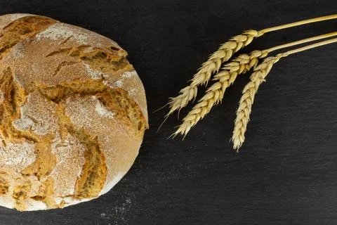 Rye wheat bread on grey stone Stock Photos