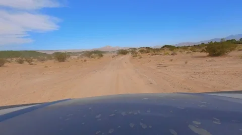 RZR Dune buggy drives through Las Vegas desert Stock Footage 111882155