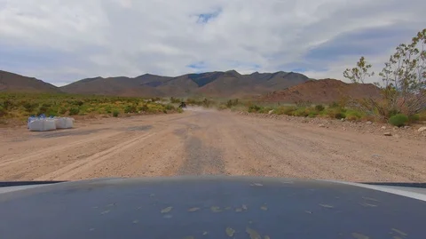 RZR Dune buggy drives through Las Vegas desert Stock Footage 111882663