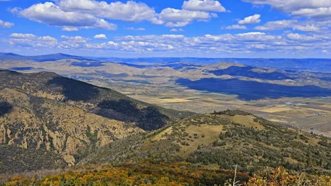 S-14449-Time Lapse-Cloud shadows roll over valley and hills Stock Footage 252098224