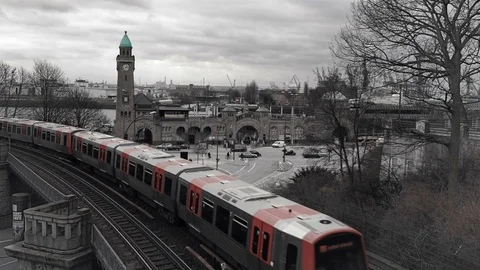 S-bahn train moving on the railway, Elbe port in the background, Clocktower at S Stock Footage 102280733