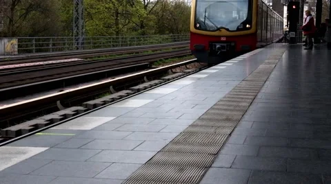 S Bahn,regional S-bahn train approaches platform, Berlin Stock Footage 62217004